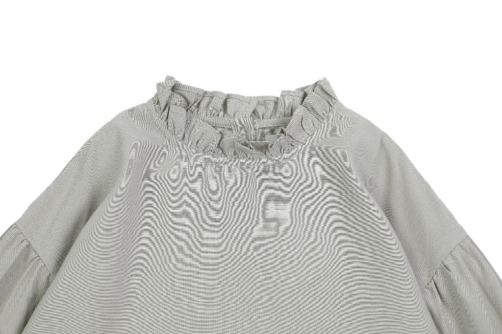 US stockist of Donsje's three quarter sleeve, Kyara Dress in Faded Jade.  Made from a linen blend.