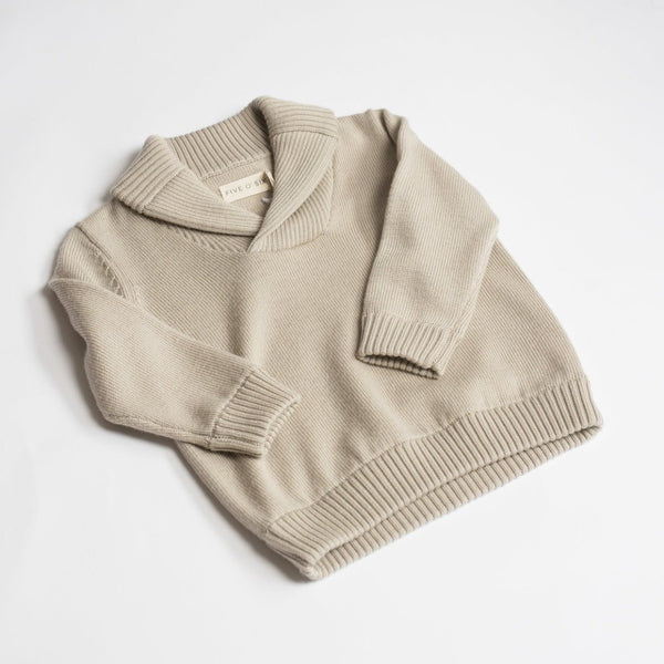 US stockist of Five O' Six's gender neutral "Bone" shawl neck sweater made from 100% merino wool.