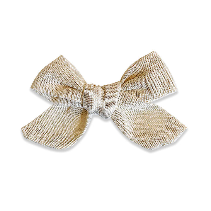 US stockist of Josie Joan's Wendy classic bow clip.  Made from cotton/linen in a neutral off white shade.