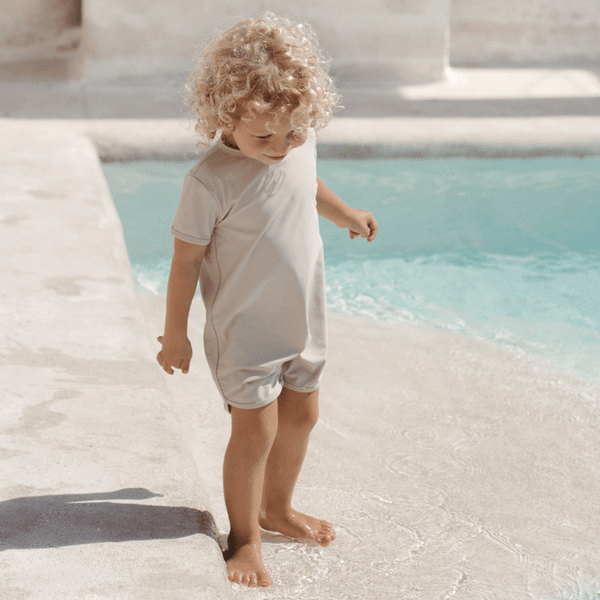 US stockist of Illoura the Label's Wren Rashsuit in Pale Khaki.  Made from UPF 50, Econyl fabric.