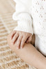 US stockist of Two Darling's long sleeve, Milk knit romper.
