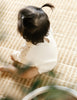 US stockist of Two Darling's long sleeve, Milk knit romper.