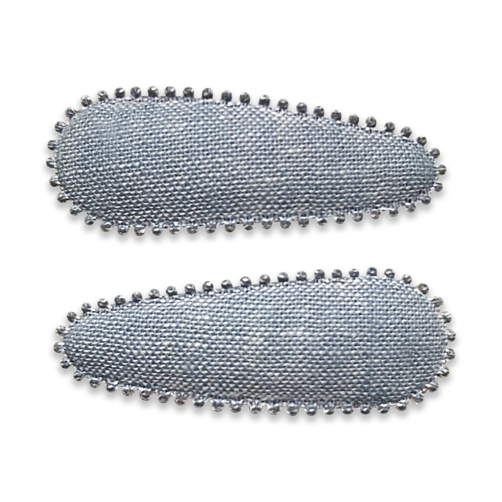 US stockist of Josie Joan's Xanthe fabric hair clips.  Comes in a set of two. Grey/Blue fabric with scalloped edge finish.
