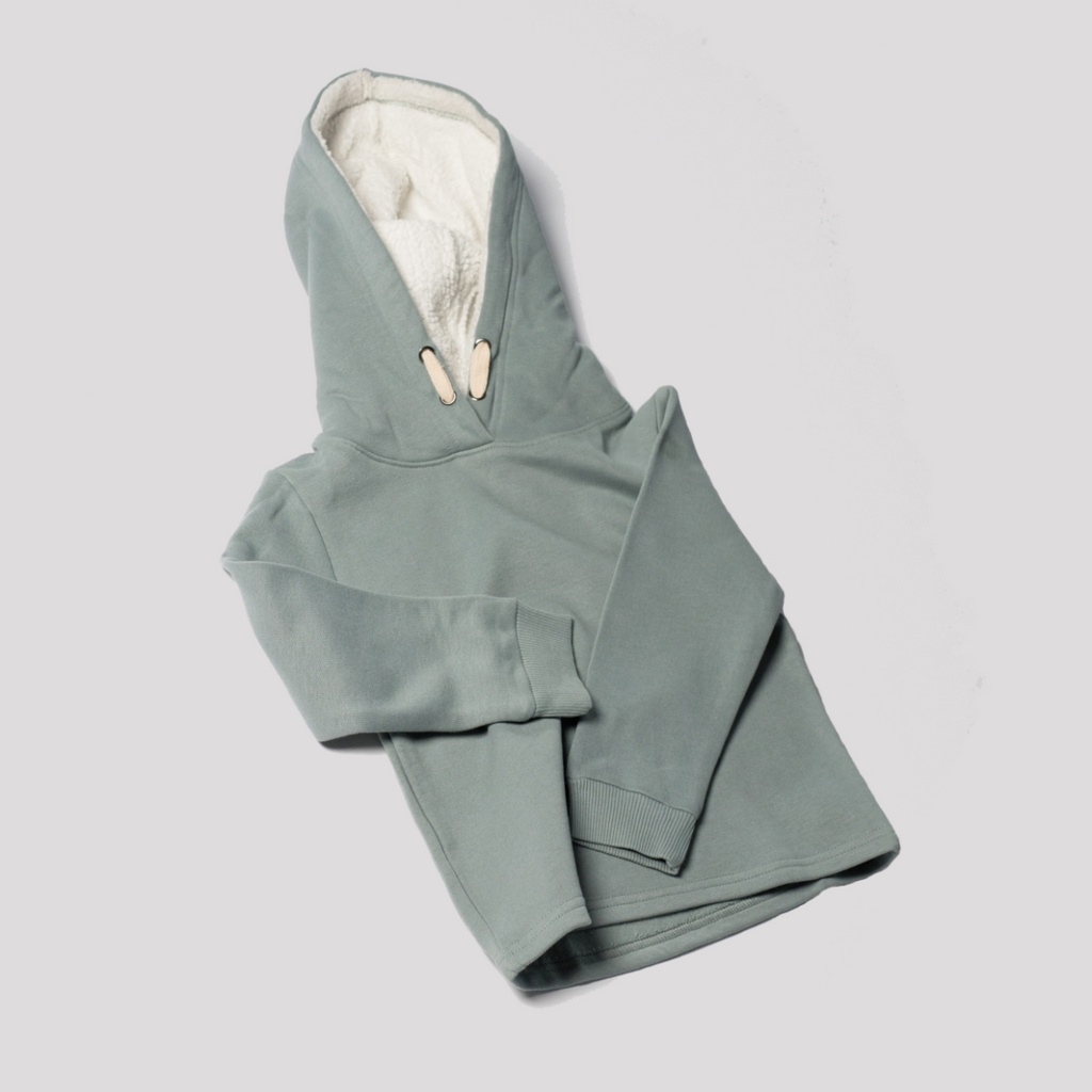 US stockist of Five O' Six's organic cotton, gender neutral hooded sweatshirt in Slate.  Features sherpa lined hooded for added warmth and comfort.