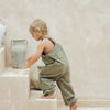 US stockist of Illoura the Label's gender neutral Xanthe Overalls in Olive Cord.