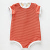 The US stockist of Zulu & Zephyr Mini Rib Onesie in Plum.  A loose fit gender neutral style made from sustainable ECONYL UPF 50+ fabric.  Short sleeved with contrasing back zipper and binds.  Fully lined.