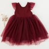 US stockist of Karibou Kid's Scarlett Tutu Dress.  Made from a soft cotton blend with midi length tulle skirt.  Features open back with a big bow.