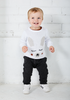 US stockist of Miann & Co's gender neutral charcoal baby knit pants. Made from 100% cotton with functional drawstring, pockets and ribbed cuffs.