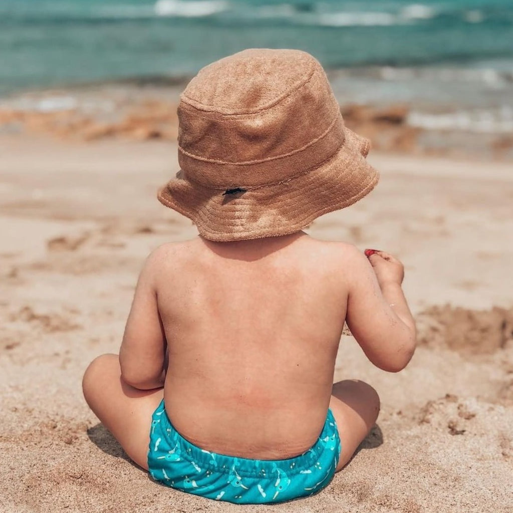 US stockist of Fini the Label's tan bucket hat made from soft terry towelling fabric.