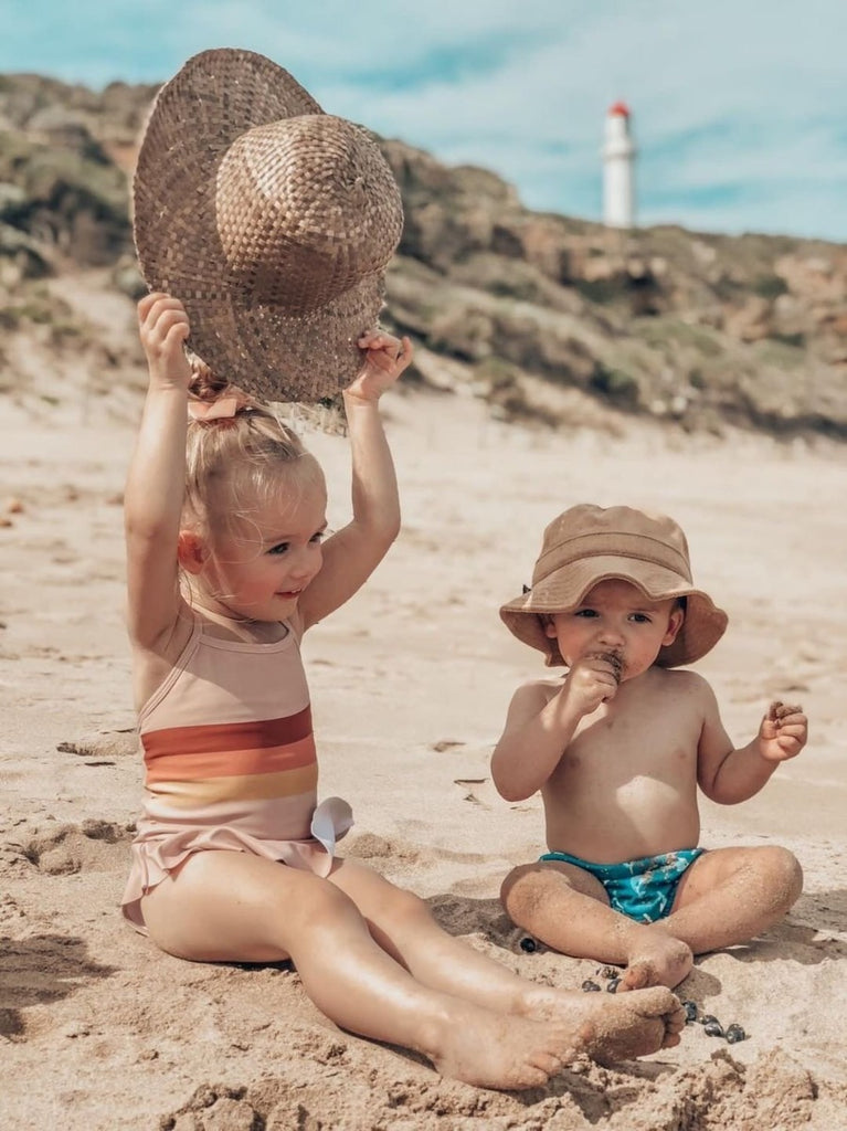 US stockist of Fini the Label's tan bucket hat made from soft terry towelling fabric.