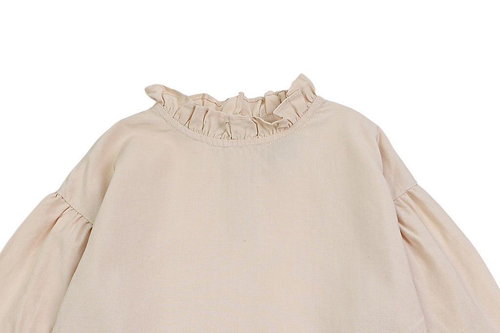 US stockist of Donsje's three quarter sleeve, Kyara Dress in Powder.  Made from a linen blend.