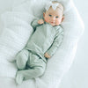 Stockist of Bonsie's rayon blend avocado green footie.  Top section has velcro wrap body which can be undone for skin to skin contact.  Elastic waist that can be pulled down for easy diaper changes. 