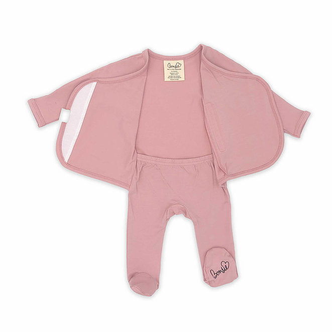 Stockist of Bonsie's rayon blend Peony pink footie.  Top section has velcro wrap body which can be undone for skin to skin contact.  Elastic waist that can be pulled down for easy diaper changes. 