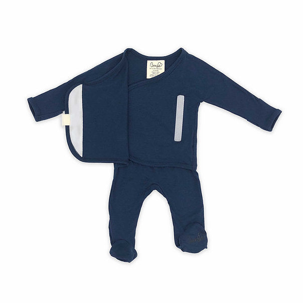 Stockist of Bonsie's rayon blend midnight blue footie.  Top section has velcro wrap body which can be undone for skin to skin contact.  Elastic waist that can be pulled down for easy diaper changes. 