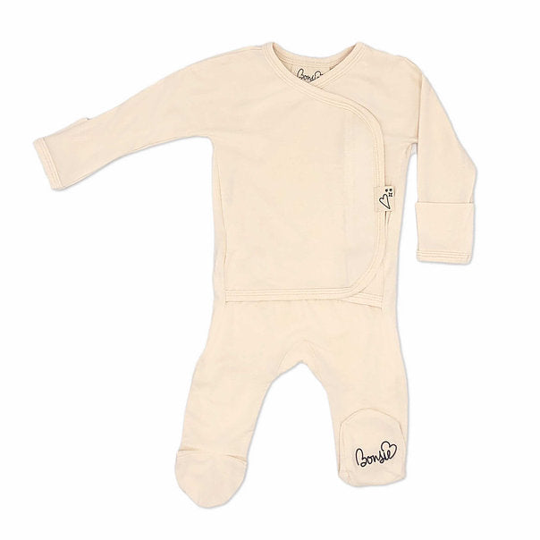 Stockist of Bonsie's rayon blend Oat footie.  Top section has velcro wrap body which can be undone for skin to skin contact.  Elastic waist that can be pulled down for easy diaper changes. 