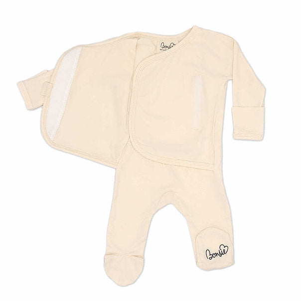 Stockist of Bonsie's rayon blend Oat footie.  Top section has velcro wrap body which can be undone for skin to skin contact.  Elastic waist that can be pulled down for easy diaper changes. 