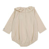 US stockist of Donsje's long sleeve chloe bodysuit in Buttercream.  Made from cotton with a ruffle neck.