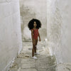 US stockist of Canopea's Grenada Red Alba ruffle neck and cross back swimsuit made from recycled UPF50 fabric.
