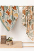 US stockist of Indus Design's cotton "Dinosaur" swaddle.