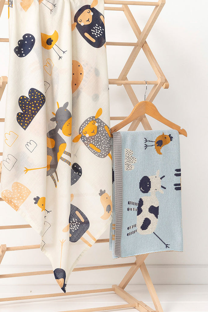 US stockist of Indus Design's cotton "Farmyard Animals" swaddle.