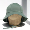 US stockist of Fini the Label's gender neutral, floppy swim hat in Ivy Green. Features elongated back for added sun protection, chin strap and adjustable bow around crown for better fit. Brim is medium stiffness and can be flipped up at front.  Made from nylon/spandex and is quick drying.