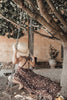US stockist of Fini the Label's vintage French style straw hat.  Made from raffia straw with a wide bell shaped brim and a trimmed natural ribbon beget chin strap.