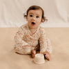 US stockist of India & Grace's long sleeve, gender neutral organic bodysuit in Dino Terrazzo.