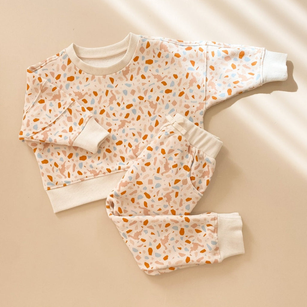 US stockist of India & Grace's gender neutral, organic cotton tracksuit in Dino Terrazzo.