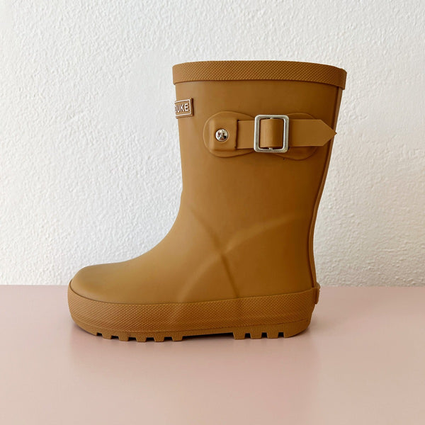 US stockist of Hubble & Duke's gender neutral, natural rubber rainboots in Sandstone.