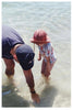 US stockist of Fini the Label's gender neutral, floppy swim hat in marsala. Features elongated back for added sun protection, chin strap and adjustable bow around crown for better fit. Brim is medium stiffness and can be flipped up at front.  Made from nylon/spandex and is quick drying.