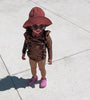 US stockist of Fini the Label's gender neutral, floppy swim hat in marsala. Features elongated back for added sun protection, chin strap and adjustable bow around crown for better fit. Brim is medium stiffness and can be flipped up at front.  Made from nylon/spandex and is quick drying.