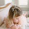 US stockist of Josie Joan's "Stella" Petite Floral Bow Hair Clip.