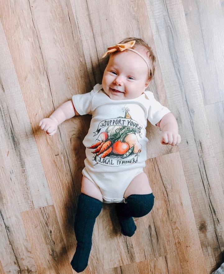 Raising Tito cream organic cotton "support your local farmer" long sleeve bodysuit
