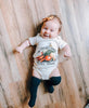 Raising Tito cream organic cotton "support your local farmer" long sleeve bodysuit