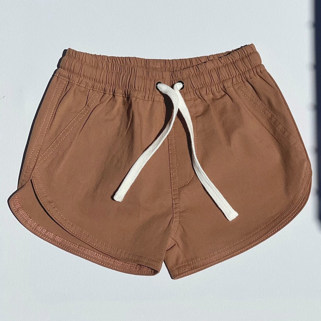 US stockist of Fini. the Label's soft cotton canvas boardshorts in Mocha.