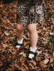 US stockist of Karibou Kid's white ankle pom pom ruffle socks.  Made from a cotton blend.