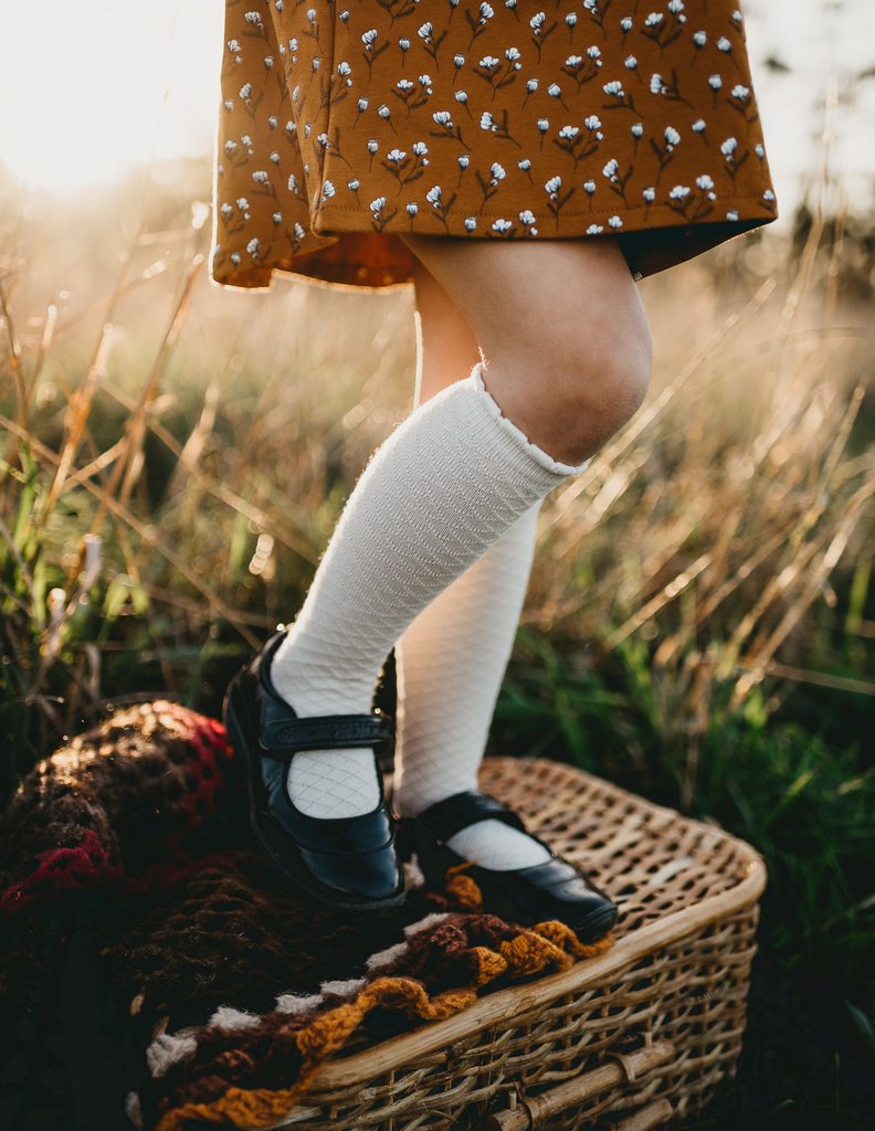 US stockist of Karibou Kid's Macaroon cotton socks. Light beige color with mesh texture and frill at top. Cotton blend.