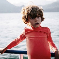 US stockist of Canopea's gender neutral, Grenada Red long sleeve rash top made from recycled UPF 50+ fabric.