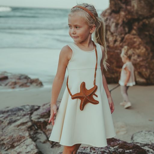 US stockist of Donsje's sleeveless Sassie Dress in Off White.