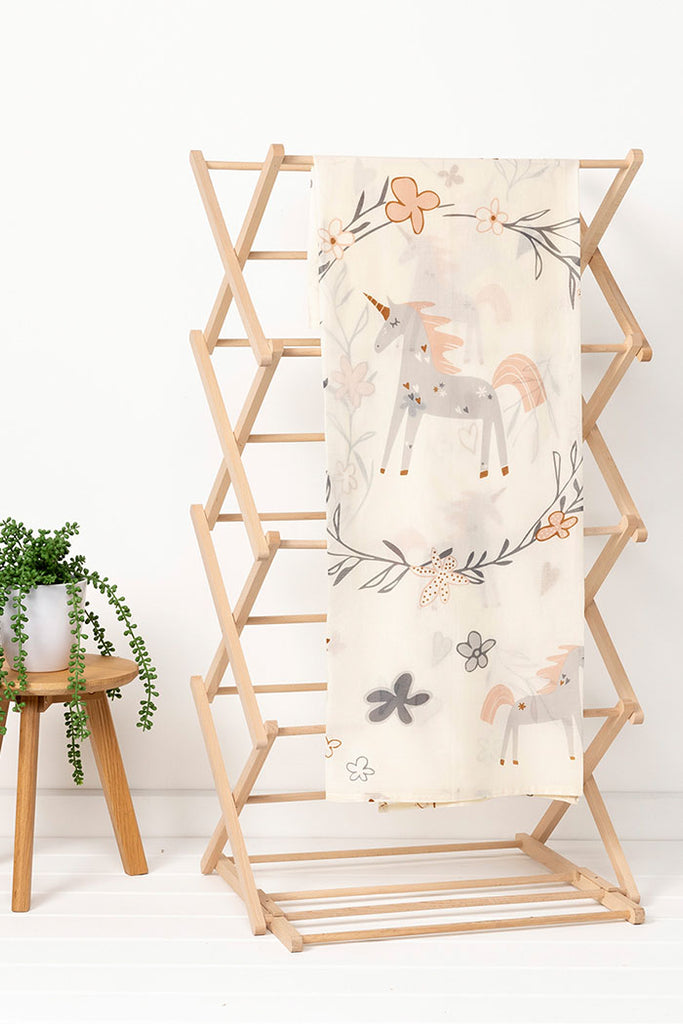 US stockist of Indus Design's cotton "Unicorn" swaddle
