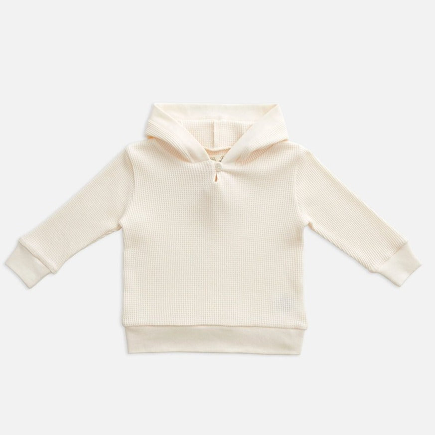 US stockist of Miann & Co's gender neutral jetstream cream baby waffle hooded sweatshirt.  Made from 100% waffle cotton.