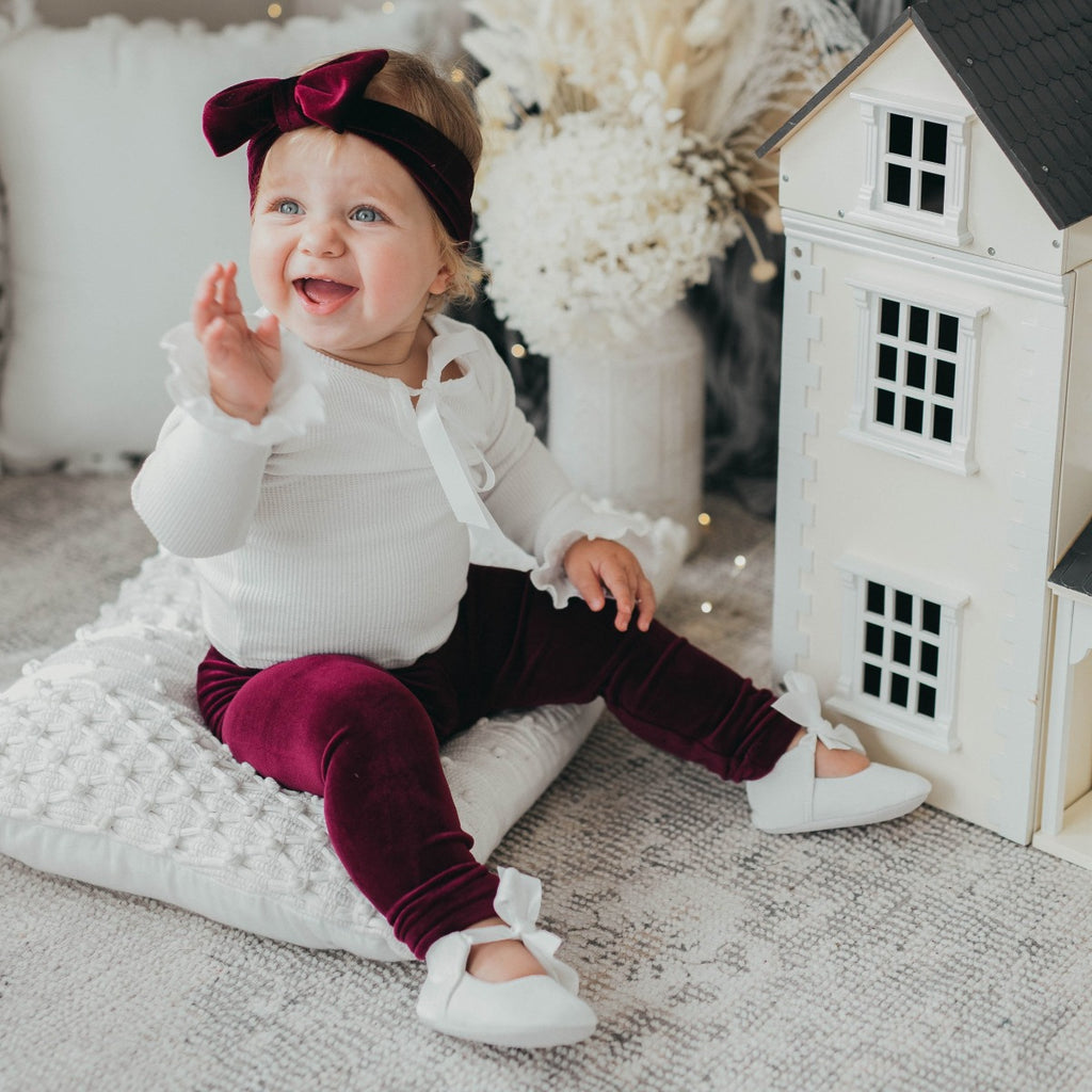 US stockist of Karibou Kids' Winnie luxe velour leggings in Sugarplum.
