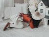 US stockist of Karibou Kid's Coco Linen Suspender Skirt in the Frosted Cherry Edition.  Features natural linen skirt with contrasting mauve suspender straps and bows on back.
