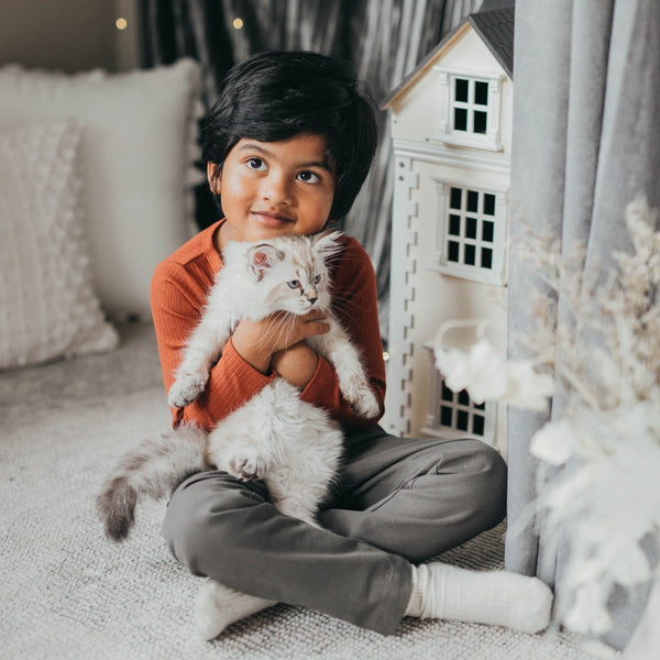 US stockist of Karibou Kids' Wolfie chino pants in grey mist.