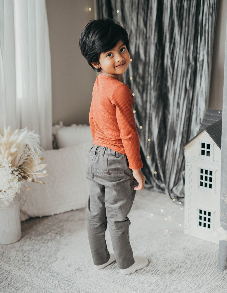 US stockist of Karibou Kids' Wolfie chino pants in grey mist.