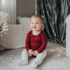 US stockist of Karibou Kids gender neutral, Storybook Red Willow long sleeve henley bodysuit in ribbed cotton blend.